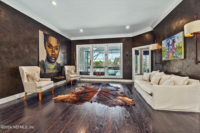 living area with a textured ceiling, wood finished floors, baseboards, french doors, and crown molding