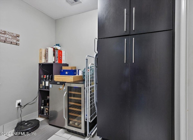 interior space featuring beverage cooler and visible vents