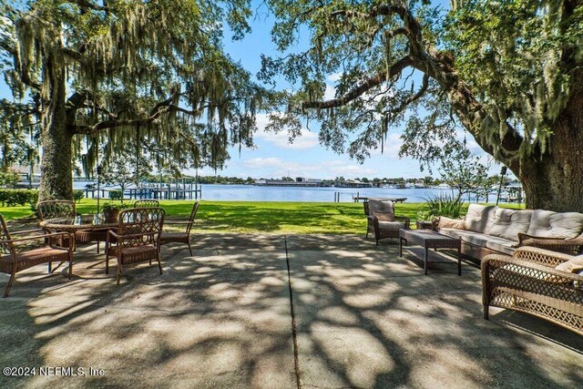 view of patio featuring a water view