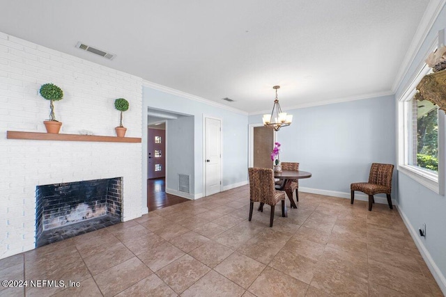 dining space featuring an inviting chandelier, visible vents, and ornamental molding