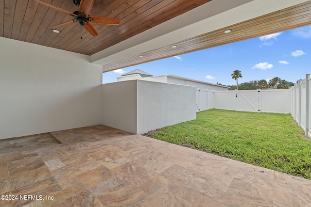 219 11th Ave S, Jacksonville Beach, FL 32250 - view of patio with a fenced backyard, a gate, and a ceiling fan