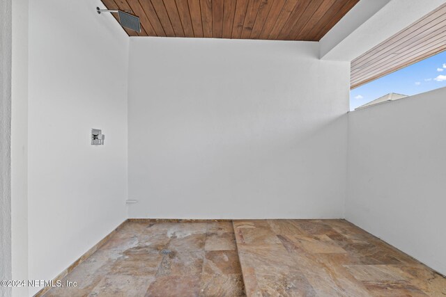 spare room with wooden ceiling