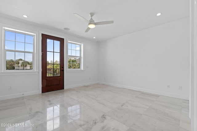 219 11th Ave S, Jacksonville Beach, FL 32250 - spare room with marble finish floor, baseboards, recessed lighting, and a ceiling fan