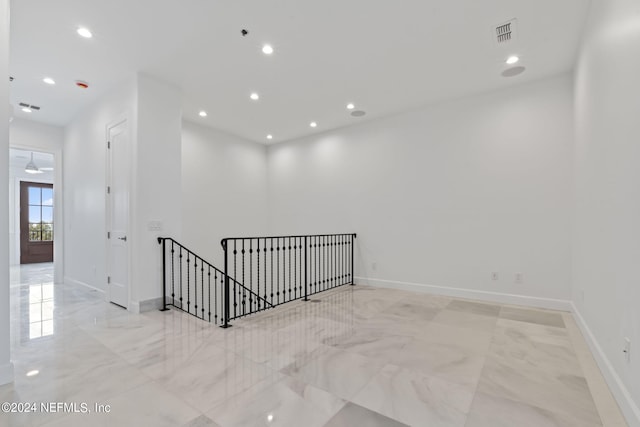 spare room featuring ceiling fan