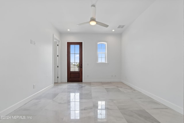 foyer featuring ceiling fan