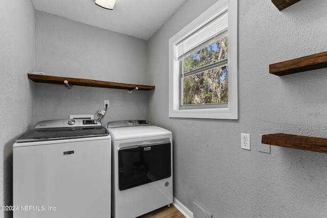 washroom with washer and clothes dryer