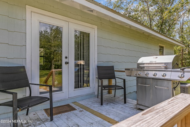 deck featuring grilling area and french doors