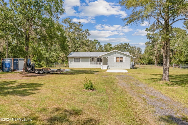 view of front of property with a front yard