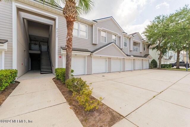 view of property featuring a garage