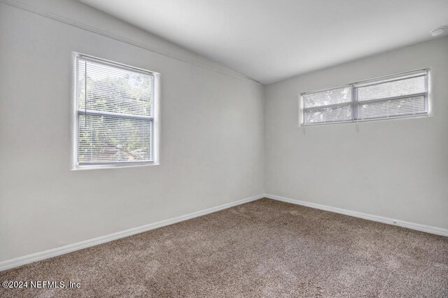 view of carpeted spare room