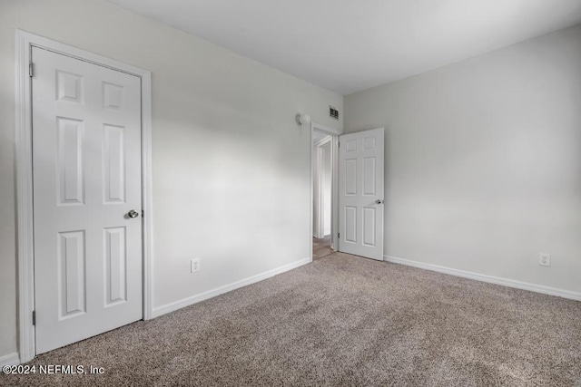 interior space featuring carpet