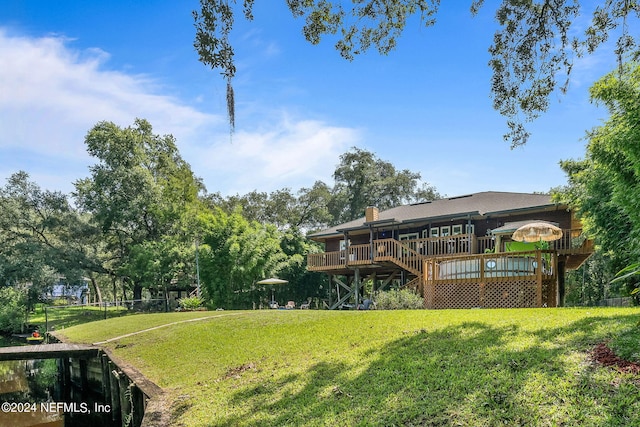 view of yard featuring a deck