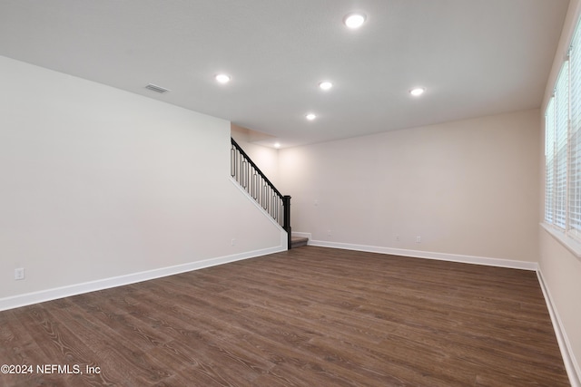 interior space with dark hardwood / wood-style floors