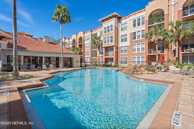 view of swimming pool featuring a patio