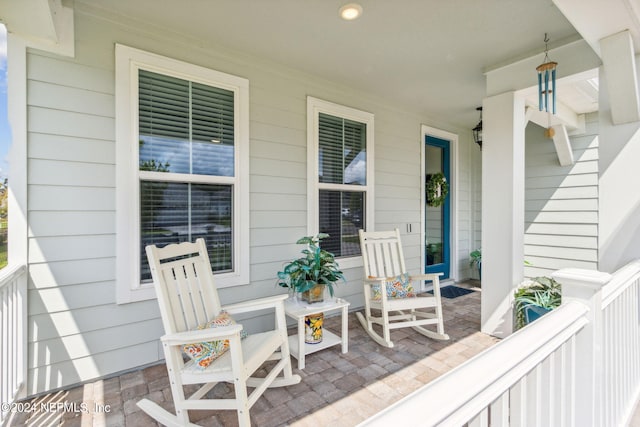 view of patio featuring a porch