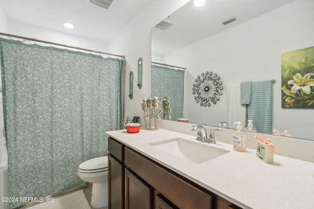 bathroom with a shower with shower curtain, toilet, and vanity