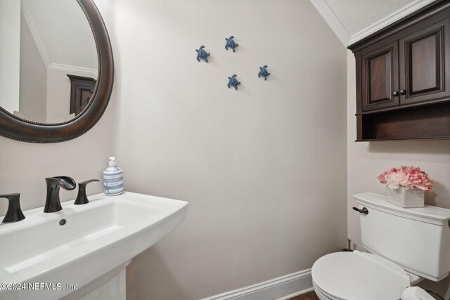 bathroom with toilet and sink