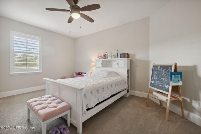 bedroom with ceiling fan and carpet floors