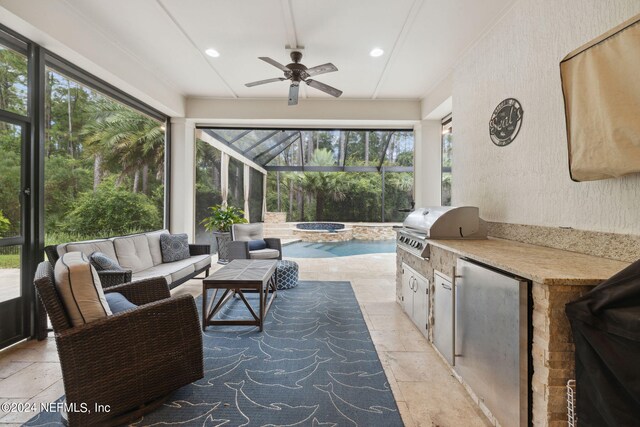 sunroom / solarium with ceiling fan and plenty of natural light