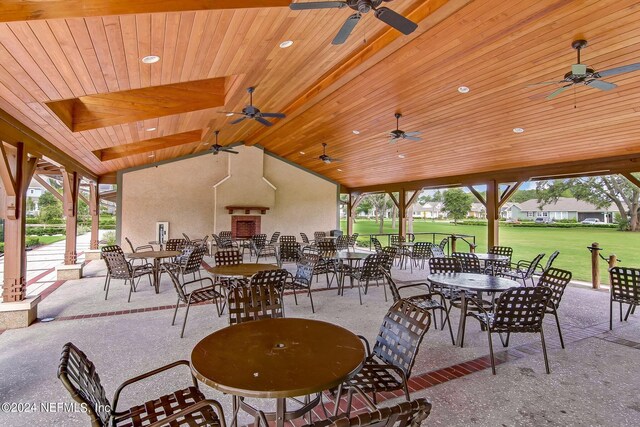 view of patio featuring ceiling fan