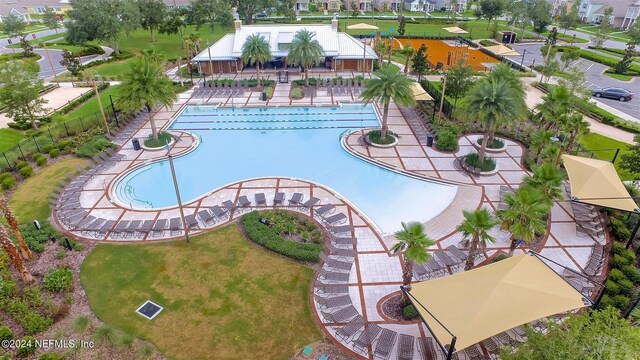 view of swimming pool with a patio