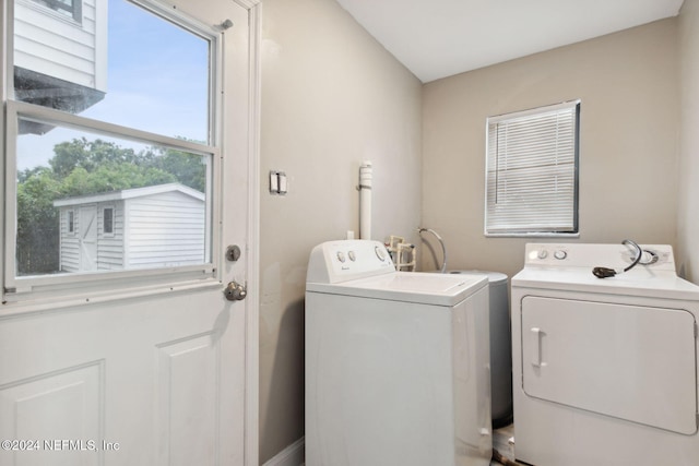 laundry room featuring washer and clothes dryer