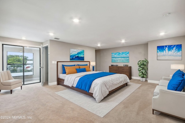 bedroom featuring light colored carpet, recessed lighting, visible vents, and baseboards