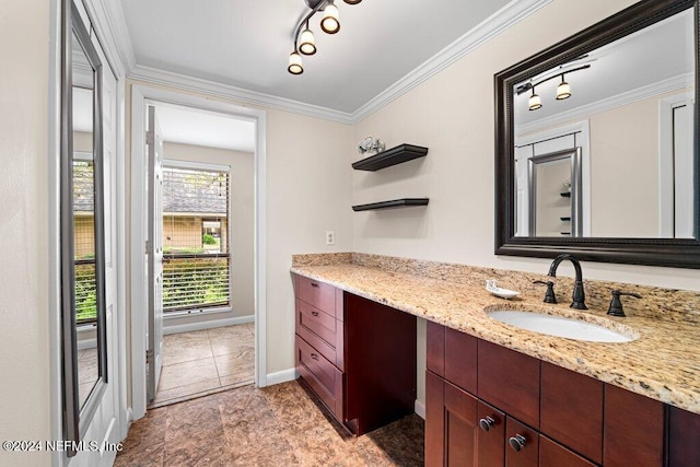 bathroom featuring vanity and crown molding