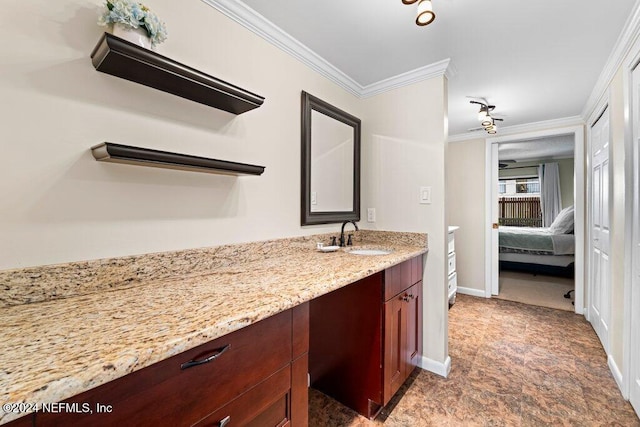 bathroom with vanity and crown molding