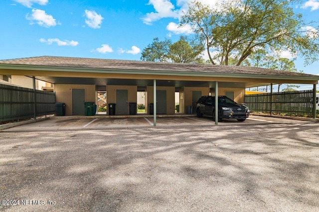 view of car parking featuring a carport