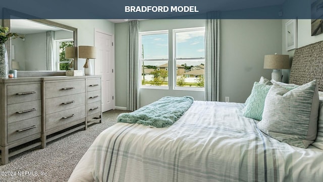 carpeted bedroom featuring baseboards