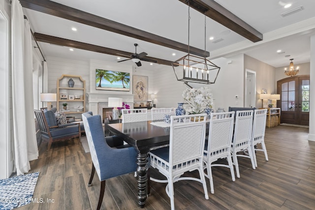 dining area with ceiling fan with notable chandelier, wooden walls, dark hardwood / wood-style flooring, and beam ceiling