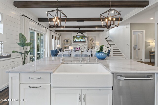 kitchen featuring an inviting chandelier, hardwood / wood-style floors, light stone countertops, white cabinetry, and beam ceiling