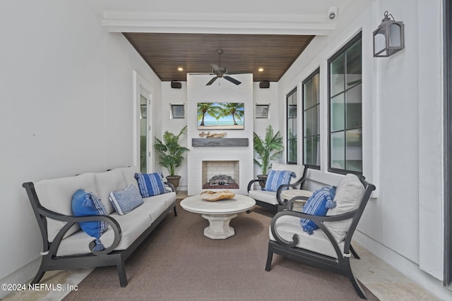 view of patio / terrace with ceiling fan and outdoor lounge area