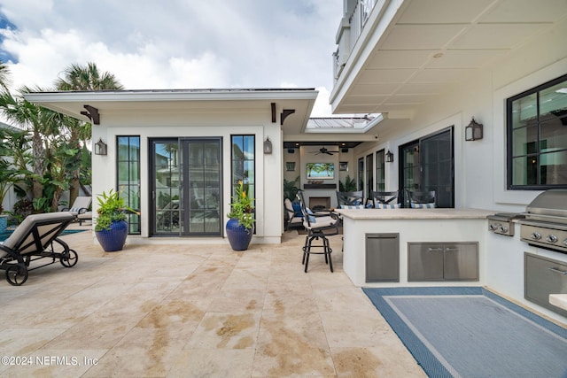 view of patio with an outdoor kitchen