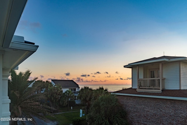 exterior space with a water view