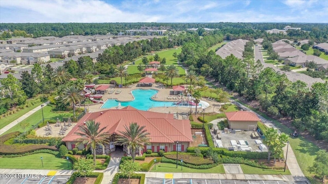 birds eye view of property with a residential view