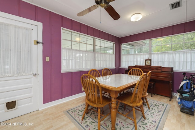 dining room featuring ceiling fan and light hardwood / wood-style floors