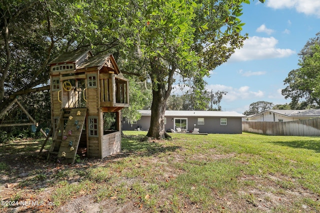 view of yard featuring a playground