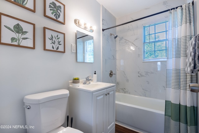 full bathroom with shower / bath combination with curtain, toilet, and vanity