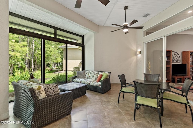 view of patio featuring outdoor lounge area, visible vents, and ceiling fan