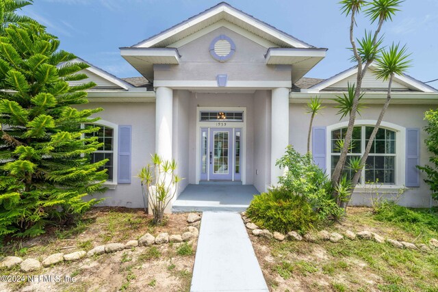 view of exterior entry with french doors