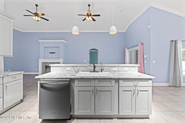 kitchen featuring dishwasher, ceiling fan, sink, and light tile patterned floors