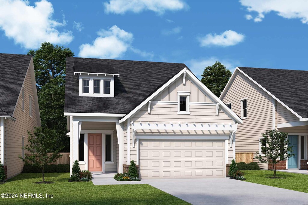 340 Sienna Palm Dr, Ponte Vedra, FL 32081 - view of front of house with a shingled roof, board and batten siding, driveway, and a front yard