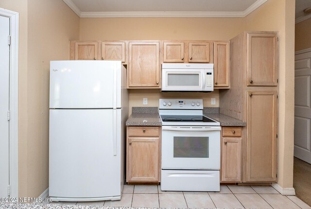 kitchen featuring light tile patterned floors, ornamental molding, white appliances, and light brown cabinetry