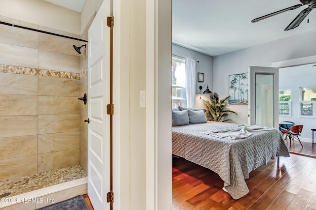 bedroom with ceiling fan and wood finished floors