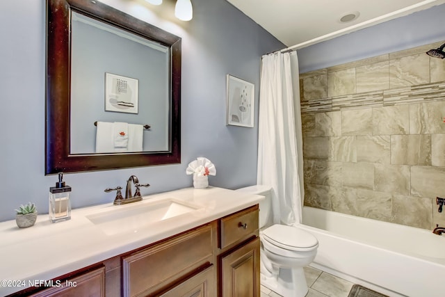 full bath with shower / tub combo, vanity, toilet, and tile patterned floors