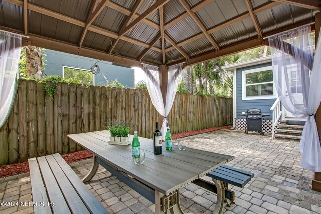 view of patio with a gazebo and a grill