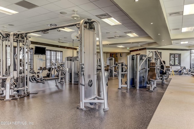 gym featuring a paneled ceiling