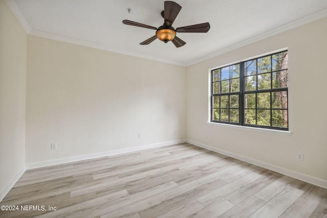 spare room featuring ceiling fan, crown molding, and light hardwood / wood-style floors